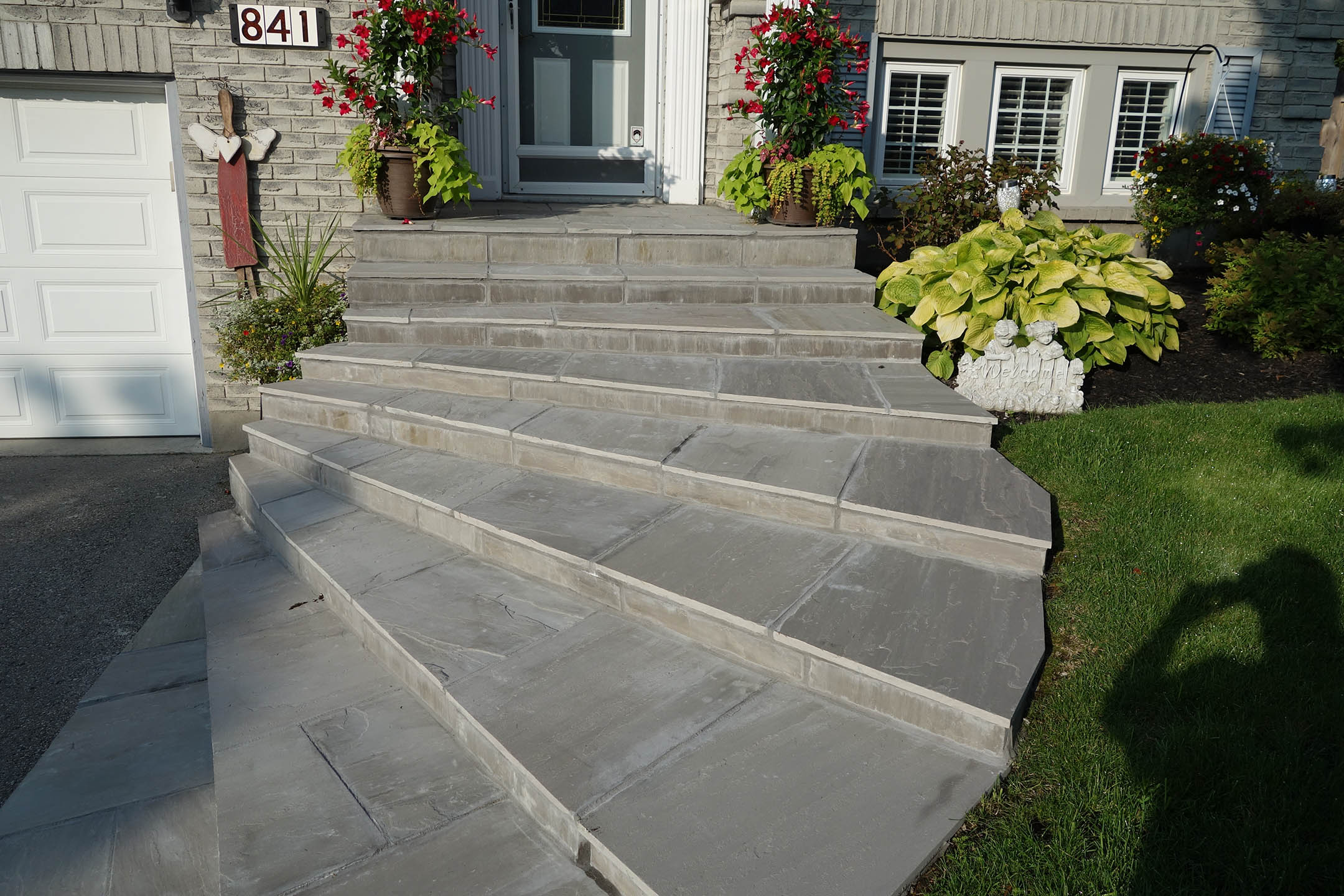 Q.E.W. Contracting Flagstone